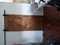 Fresh paint on the wall and a new sliding barn door.