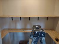 The beginning of the shelving being put in. Here we are customer fitting it all in before staining with a rich color.