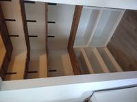 The completed pantry shelving created ample space for our customer to store all of their kitchen goodies from extra appliances to canned goods.
