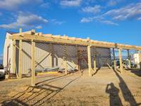 Posts & rafters installed, extra bracing was installed along the back to keep it as strong as possible against storms.