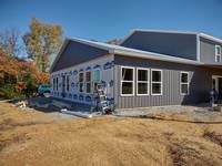 Windows and siding being installed