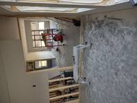 Interior drywall being installed